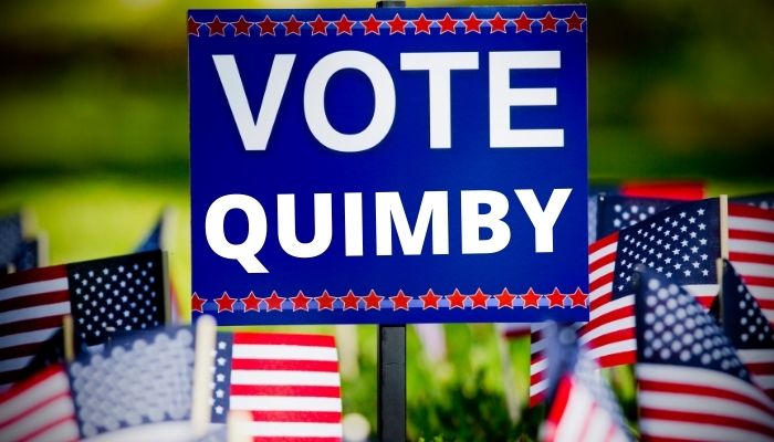 political yard sign with flags