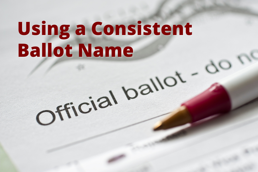 official ballot with pen to write in candidate